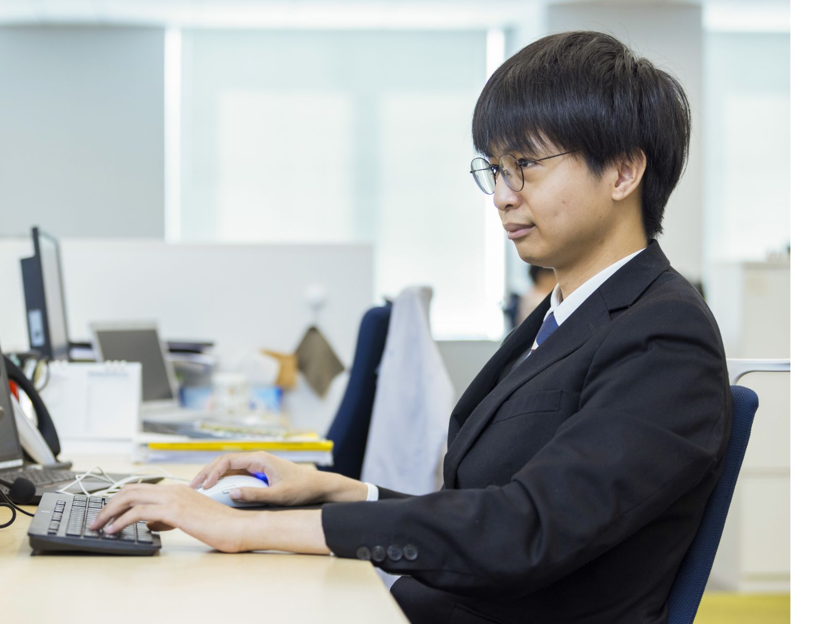 経済学部出身で未経験からスタートも、設計向けの社内外システム開発に幅広く携わる
