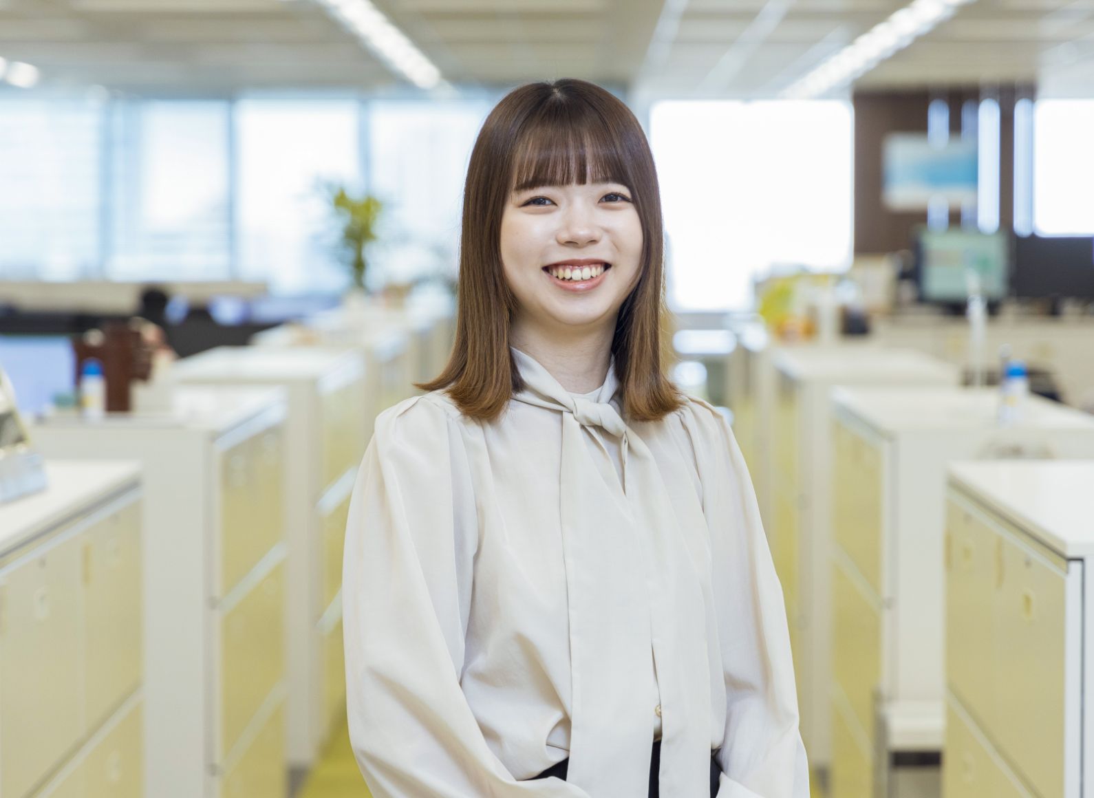 担当